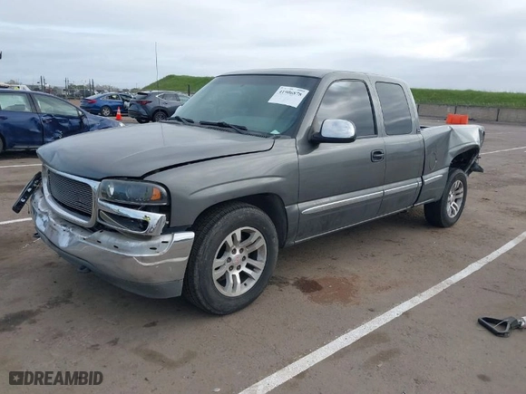 2002 GMC Sierra 1500 SLE with VIN 2GTEC19V121231109, listed as a IAAI auction lot 41906878 with 237,729 mi miles. Bid and sale history available at carsss.com. Image 2.