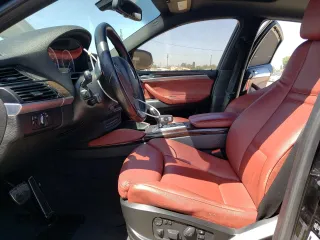 2013 BMW X6 xDrive50i with VIN 5UXFG8C53DL591326, listed as a Copart auction lot 67982234 with 100,041 mi miles and Salvage Title. Bid and sale history available at carsss.com. Image 7.