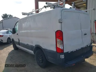 2015 Ford Transit Cargo with VIN 1FTNE1ZM6FKA63779, listed as a IAAI auction lot 41367212 with 208,866 mi miles and . Bid and sale history available at carsss.com. Image 3.