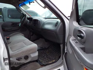 2002 Ford F-150 XLT with VIN 1FTRW08L02KE29411, listed as a IAAI auction lot 42133550 with 270,752 mi miles. Bid and sale history available at carsss.com. Image 5.