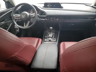 2022 Mazda CX-30 S Carbon Edition с VIN 3MVDMBCL7NM429131, выставлен на аукционе Copart как лот 42421695 с пробегом 21 825 миль миль и Списание • Salvage title. История ставок и продаж доступна на DreamBid. Изображение 8.