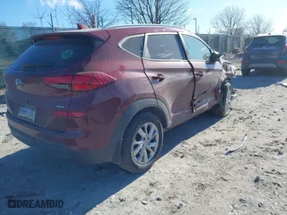 2020 Hyundai Tucson Value with VIN KM8J3CA42LU149811, listed as a IAAI auction lot 41642255 with 60,936 mi miles. Bid and sale history available at carsss.com. Image 4.