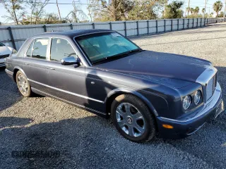 2005 Bentley Arnage R z VIN SCBLC37F65CX10805, wystawiony jako Copart lot #80332124 z przebiegiem Nie podano mil oraz Nie do naprawy. Historia ofert i sprzedaży dostępna na DreamBid. Obrazek 4.