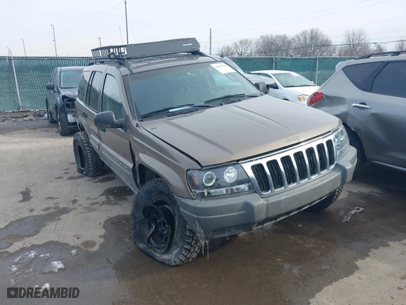 2002 Jeep Grand Cherokee Laredo with VIN 1J4GW48N12C193792, listed as a IAAI auction lot 41545283 with 166,720 mi miles. Bid and sale history available at carsss.com. Image 1.