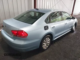 2012 Volkswagen Passat S w/Appearance with VIN 1VWAP7A30CC042041, listed as a IAAI auction lot 42051506 with 154,896 mi miles. Bid and sale history available at carsss.com. Image 4.