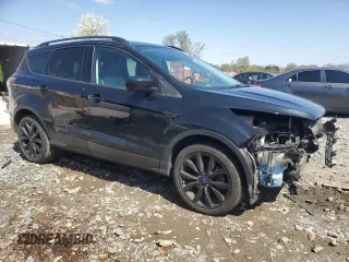 2017 Ford Escape SE with VIN 1FMCU0G95HUF02878, listed as a Copart auction lot 51293845 with 116,443 mi miles and Salvage Title. Bid and sale history available at carsss.com. Image 4.