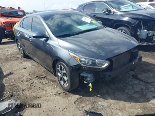 2019 Kia Forte LXS with VIN 3KPF24AD9KE112092, listed as a IAAI auction lot 41795486 with 77,603 mi miles and . Bid and sale history available at carsss.com. Image 1.