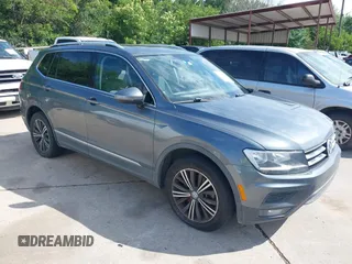 2018 Volkswagen Tiguan SEL z VIN 3VV3B7AX9JM023420, wystawiony jako IAAI lot #42397988 z przebiegiem 124 650 mil mil oraz . Historia ofert i sprzedaży dostępna na DreamBid. Obrazek 1.