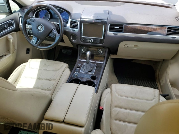 2013 Volkswagen Touareg Lux with VIN WVGEF9BP8DD002947, listed as a Copart auction lot 52590164 with 144,831 mi miles and Salvage Title. Bid and sale history available at DreamBid. Image 8.