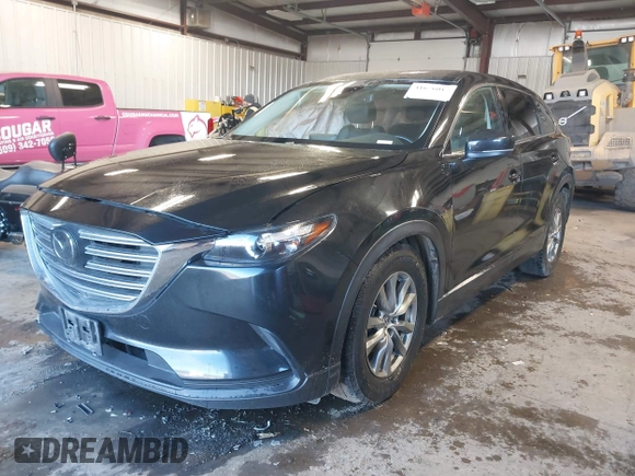 2018 Mazda CX-9 Touring with VIN JM3TCBCY4J0227069, listed as a IAAI auction lot 41676017 with 77,844 mi miles. Bid and sale history available at carsss.com. Image 18.