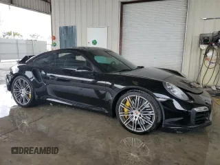 2014 Porsche 911 Turbo with VIN WP0AD2A95ES168052, listed as a Copart auction lot 74014314 with 32,387 mi miles and Salvage Title. Bid and sale history available at carsss.com. Image 4.