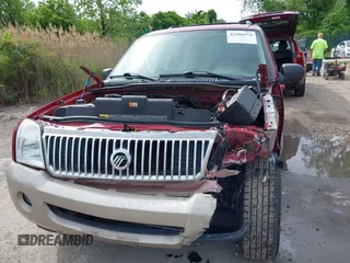 2004 Mercury Mountaineer Convenience z VIN 4M2DU86W14UJ06529, wystawiony jako IAAI lot #42206974 z przebiegiem 129 812 mil mil oraz . Historia ofert i sprzedaży dostępna na DreamBid. Obrazek 6.
