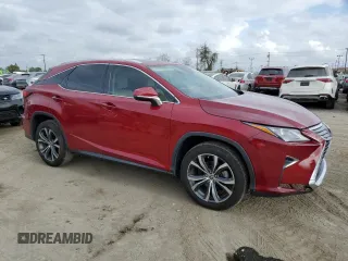 2020 Lexus RX with VIN 2T2HZMAA4LC151937, listed as a Copart auction lot 54779565 with 39,401 mi miles and Salvage Title. Bid and sale history available at carsss.com. Image 4.
