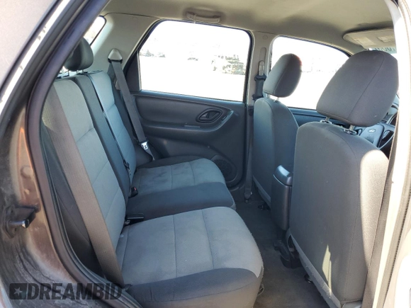 2007 Ford Escape XLS z VIN 1FMYU02Z77KA52643, wystawiony jako Copart lot #50971365 z przebiegiem 183 604 mil mil oraz Szkoda całkowita • Salvage title. Historia ofert i sprzedaży dostępna na DreamBid. Obrazek 11.