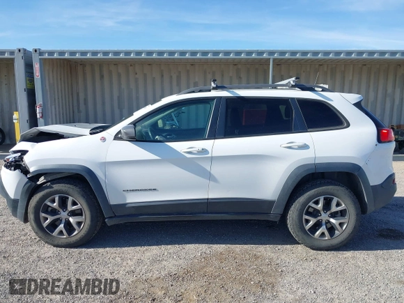 2017 Jeep Cherokee Trailhawk L Plus z VIN 1C4PJMBS1HD217370, wystawiony jako IAAI lot #42486588 z przebiegiem 108 695 mil mil oraz . Historia ofert i sprzedaży dostępna na DreamBid. Obrazek 14.
