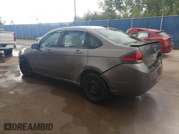 2010 Ford Focus SES with VIN 1FAHP3GN1AW244391, listed as a Copart auction lot 72893804 with Not Provided miles and Salvage Title. Bid and sale history available at DreamBid. Image 2.