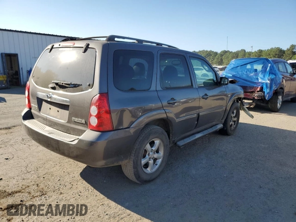 2006 Mazda Tribute S with VIN 4F2YZ06136KM31485, listed as a Copart auction lot 75412344 with Not Provided miles and Salvage Title. Bid and sale history available at DreamBid. Image 3.