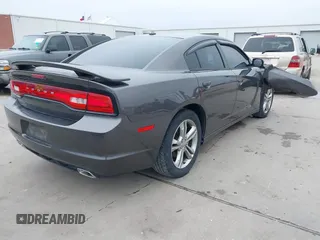 2013 Dodge Charger SXT z VIN 2C3CDXJG5DH572032, wystawiony jako IAAI lot #41707058 z przebiegiem 109 147 mil mil oraz . Historia ofert i sprzedaży dostępna na DreamBid. Obrazek 4.