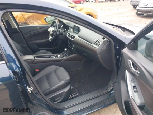 2016 Mazda Mazda6 i Grand Touring with VIN JM1GJ1W57G1486962, listed as a IAAI auction lot 41813471 with 64,078 mi miles. Bid and sale history available at carsss.com. Image 5.