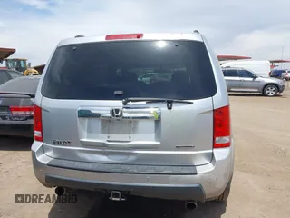 2011 Honda Pilot Touring z VIN 5FNYF3H90BB006634, wystawiony jako IAAI lot #42388390 z przebiegiem 218 475 mil mil oraz . Historia ofert i sprzedaży dostępna na DreamBid. Obrazek 16.