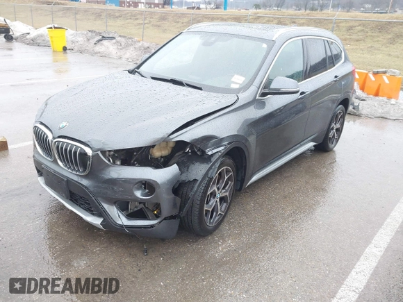 2019 BMW X1 sDrive28i with VIN WBXHU7C52K5L12160, listed as a IAAI auction lot 41452244 with 59,344 mi miles and . Bid and sale history available at DreamBid. Image 2.