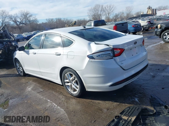 2013 Ford Fusion SE with VIN 3FA6P0HRXDR243139, listed as a IAAI auction lot 41441509 with 196,961 mi miles and . Bid and sale history available at DreamBid. Image 3.