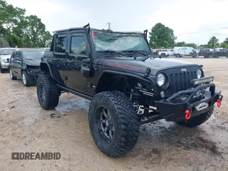 2015 Jeep Wrangler Unlimited Rubicon Hard Rock with VIN 1C4HJWFG0FL674700, listed as a IAAI auction lot 42511949 with 138,370 mi miles and . Bid and sale history available at DreamBid. Image 1.