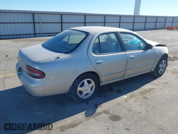 1997 Nissan Altima XE with VIN 1N4BU31D4VC221788, listed as a IAAI auction lot 41356945 with 136,931 mi miles. Bid and sale history available at carsss.com. Image 4.
