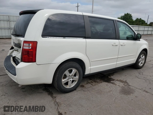 2009 Dodge Grand Caravan SE z VIN 2D8HN44EX9R533530, wystawiony jako Copart lot #59548375 z przebiegiem 130 956 mil mil oraz Szkoda całkowita • Salvage title. Historia ofert i sprzedaży dostępna na DreamBid. Obrazek 3.