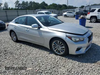 2018 Infiniti Q50 Luxe with VIN JN1EV7AP5JM352175, listed as a Copart auction lot 61762335 with 64,375 mi miles and Salvage title. Bid and sale history available at DreamBid. Image 4.