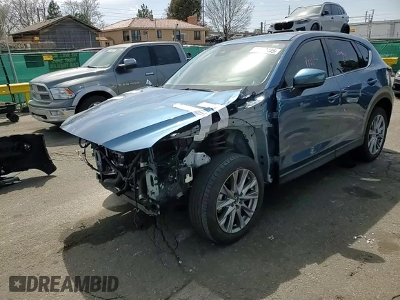2021 Mazda CX-5 Grand Touring Reserve with VIN JM3KFBAY8M0384498, listed as a Copart auction lot 52013445 with 20,469 mi miles and Salvage Title. Bid and sale history available at carsss.com. Image 11.