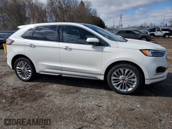 2021 Ford Edge Titanium z VIN 2FMPK4K93MBA52444, wystawiony jako Copart lot #51752835 z przebiegiem 67 137 mil mil oraz Czysty tytuł • Clean title. Historia ofert i sprzedaży dostępna na DreamBid. Obrazek 4.