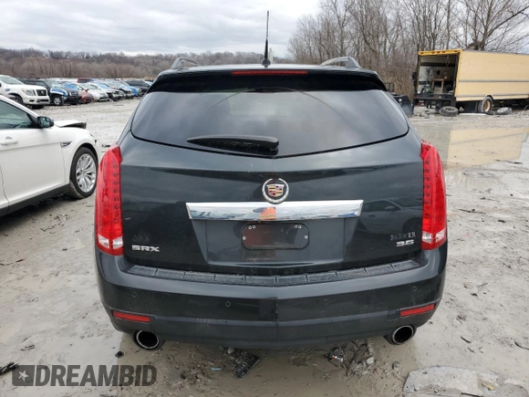 2014 Cadillac SRX Luxury Collection with VIN 3GYFNBE39ES655939, listed as a Copart auction lot 42861105 with 164,915 mi miles and Salvage Title. Bid and sale history available at DreamBid. Image 6.