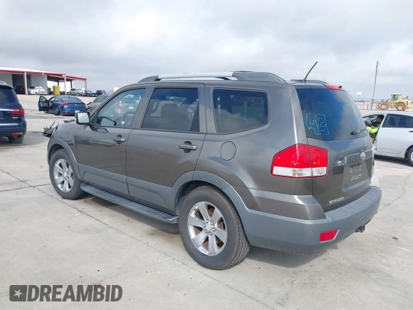 2009 Kia Borrego LX with VIN KNDJJ741995016159, listed as a IAAI auction lot 41498450 with 164,520 mi miles. Bid and sale history available at carsss.com. Image 3.