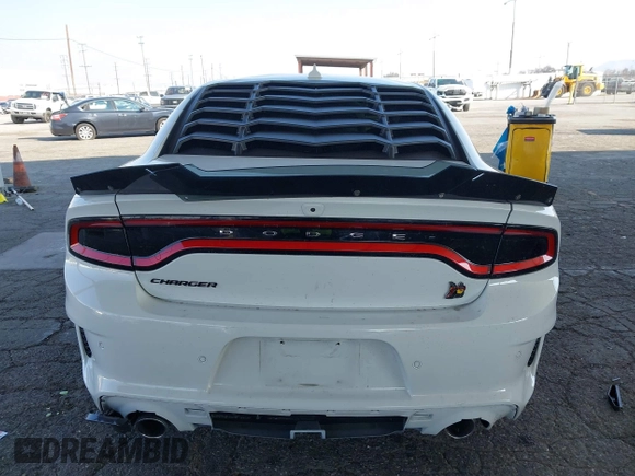 2023 Dodge Charger Scat Pack Widebody with VIN 2C3CDXGJ6PH635498, listed as a IAAI auction lot 41448100 with 13,678 mi miles and . Bid and sale history available at DreamBid. Image 17.