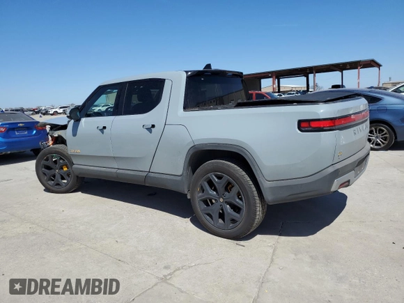 2022 Rivian R1T Adventure z VIN 7FCTGAAAXNN014983, wystawiony jako Copart lot #48987605 z przebiegiem Nie podano mil oraz Szkoda całkowita • Salvage title. Historia ofert i sprzedaży dostępna na DreamBid. Obrazek 2.