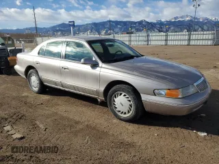1995 Lincoln Continental with VIN 1LNLM97V4SY691749, listed as a Copart auction lot 41815915 with 69,582 mi miles and Salvage Title. Bid and sale history available at carsss.com. Image 4.