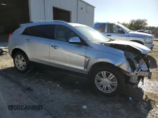 2014 Cadillac SRX Luxury Collection with VIN 3GYFNBE30ES596974, listed as a Copart auction lot 53278375 with 61,452 mi miles and Salvage Title. Bid and sale history available at DreamBid. Image 4.