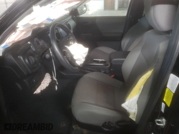 2023 Toyota Tacoma SR z VIN 3TYRZ5CN0PT032427, wystawiony jako Copart lot #87620985 z przebiegiem 32 010 mil mil oraz Szkoda całkowita • Salvage title. Historia ofert i sprzedaży dostępna na DreamBid. Obrazek 7.