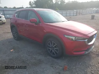 2017 Mazda CX-5 Grand Touring with VIN JM3KFADL8H0189033, listed as a IAAI auction lot 40029931 with 88,933 mi miles and . Bid and sale history available at carsss.com. Image 1.