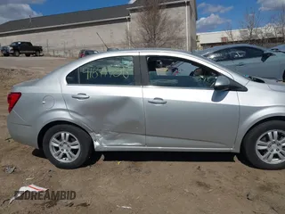 2015 Chevrolet Sonic LT with VIN 1G1JC5SH5F4212883, listed as a IAAI auction lot 41877786 with 91,941 mi miles and . Bid and sale history available at DreamBid. Image 13.