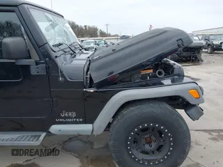 2004 Jeep Wrangler Sport with VIN 1J4FA49S64P794559, listed as a IAAI auction lot 41644201 with 107,445 mi miles. Bid and sale history available at carsss.com. Image 18.