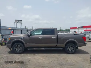 2016 Nissan Titan SL z VIN 1N6BA1F48GN510113, wystawiony jako IAAI lot #42252271 z przebiegiem 58 691 mil mil oraz . Historia ofert i sprzedaży dostępna na DreamBid. Obrazek 14.