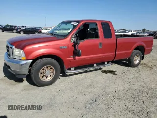 2002 Ford F-250 XL with VIN 1FTNX20F02EB64128, listed as a Copart auction lot 51979895 with 162,117 mi miles and Salvage title. Bid and sale history available at DreamBid. Image 1.