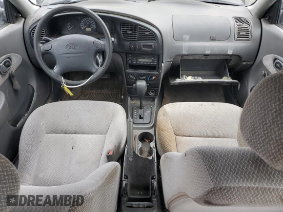 2003 Kia Spectra with VIN KNAFB121235248271, listed as a Copart auction lot 82426614 with 151,347 mi miles and Salvage Title. Bid and sale history available at DreamBid. Image 8.