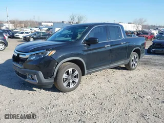 2019 Honda Ridgeline RTL-E with VIN 5FPYK3F7XKB033652, listed as a IAAI auction lot 41751421 with 96,774 mi miles. Bid and sale history available at carsss.com. Image 16.