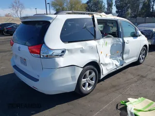 2012 Toyota Sienna LE AAS with VIN 5TDKK3DCXCS276325, listed as a IAAI auction lot 41791385 with 133,635 mi miles. Bid and sale history available at carsss.com. Image 4.