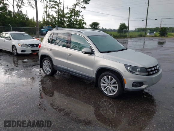 2013 Volkswagen Tiguan SE z VIN WVGAV7AX2DW532486, wystawiony jako IAAI lot #42813235 z przebiegiem 164 321 mil mil oraz . Historia ofert i sprzedaży dostępna na DreamBid. Obrazek 1.