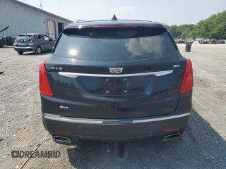 2019 Cadillac XT5 Premium Luxury AWD with VIN 1GYKNFRS9KZ223065, listed as a Copart auction lot 60902645 with 101,168 mi miles and Salvage title. Bid and sale history available at DreamBid. Image 6.