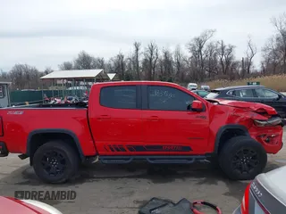 2018 Chevrolet Colorado 4WD Z71 z VIN 1GCGTDEN8J1141945, wystawiony jako IAAI lot #41837680 z przebiegiem 67 686 mil mil oraz . Historia ofert i sprzedaży dostępna na DreamBid. Obrazek 13.